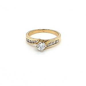 14K Yellow Gold .20CT RBC Diamond Centre & 10 Diamond Engagement Ring