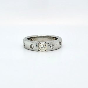18K White Gold .27CT Round Brilliant Cut Diamond Centre & 8 Gypsy Set Diamond Engagement Ring