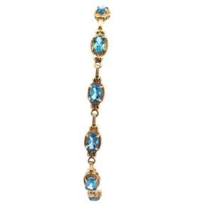 10K Yellow Gold 11 Oval Blue Topaz 7.5″ Tennis Bracelet