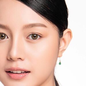 Pair of 10K Yellow Gold Dangle Earrings w/ Oval Emerald & 1 Diamond Accent