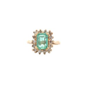 10K Yellow Gold Ring w/1.15CT Emerald Cut Emerald Centre & 14 RBC Diamond Halo